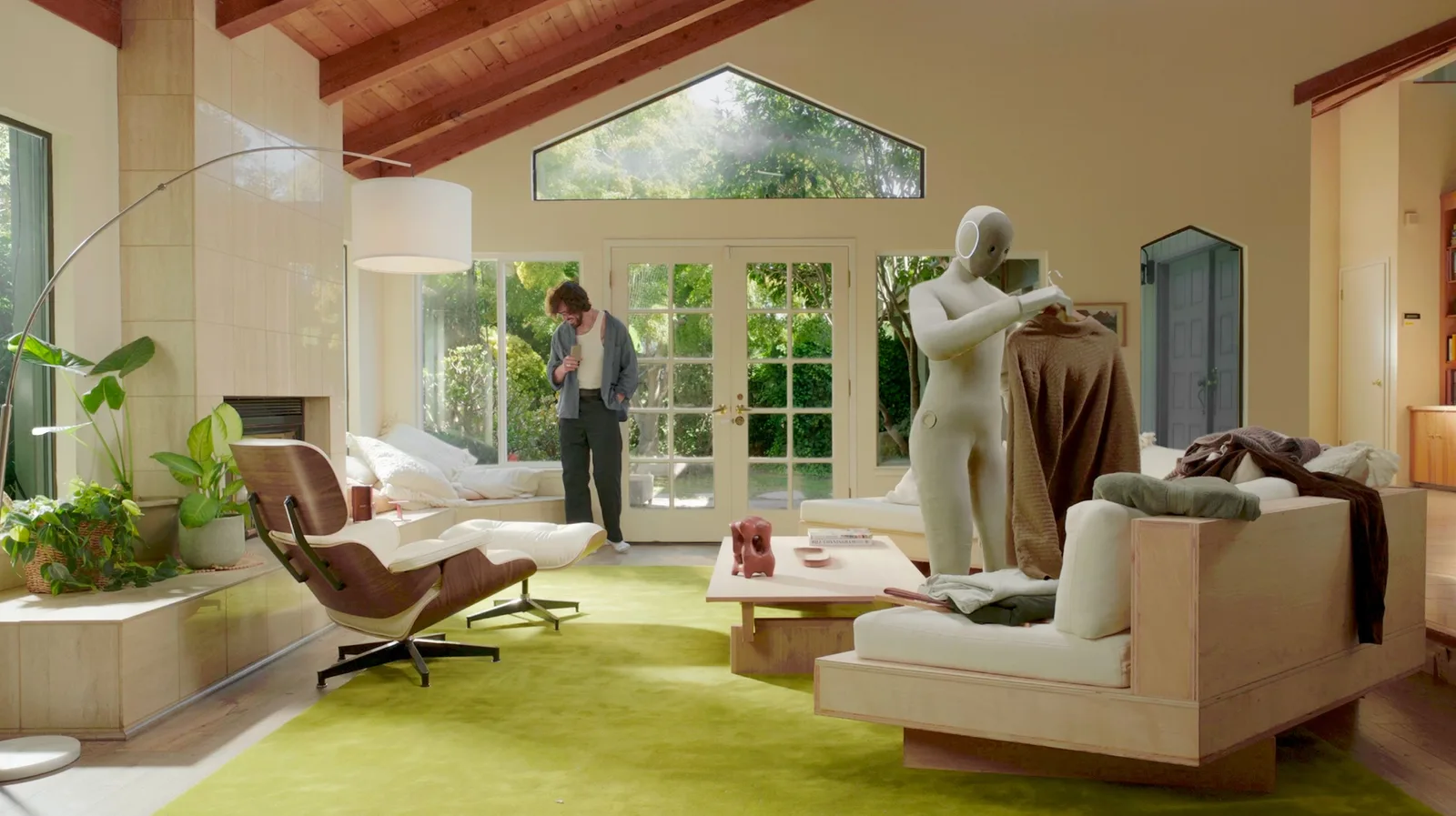 1X NEO robot in a domestic living room
