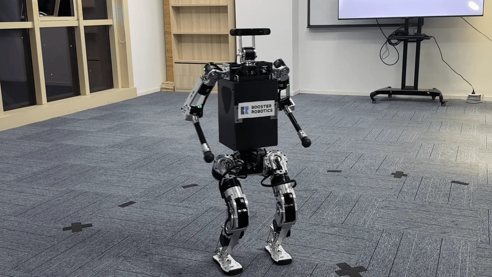 Booster Robotics T1 humanoid robot in a lab