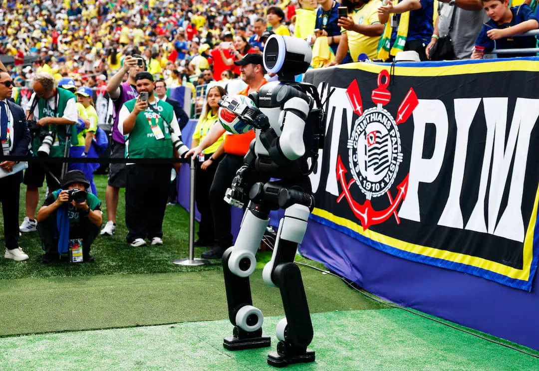 Atlas robot appearing in front of a stadium crowd