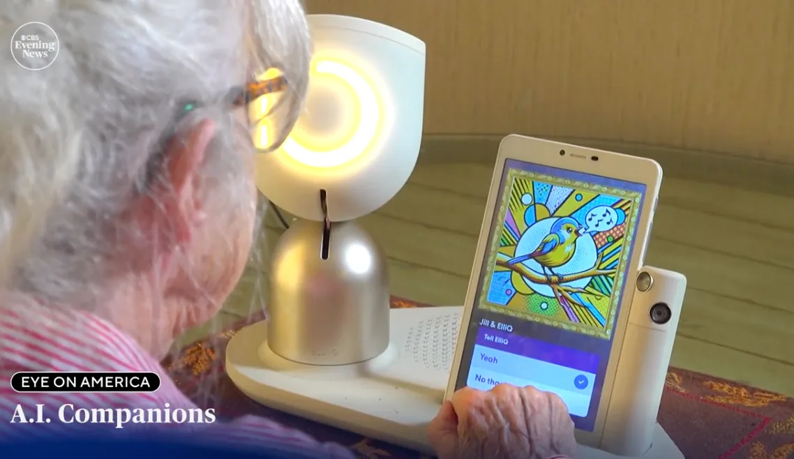 ElliQ displaying artwork on its companion screen