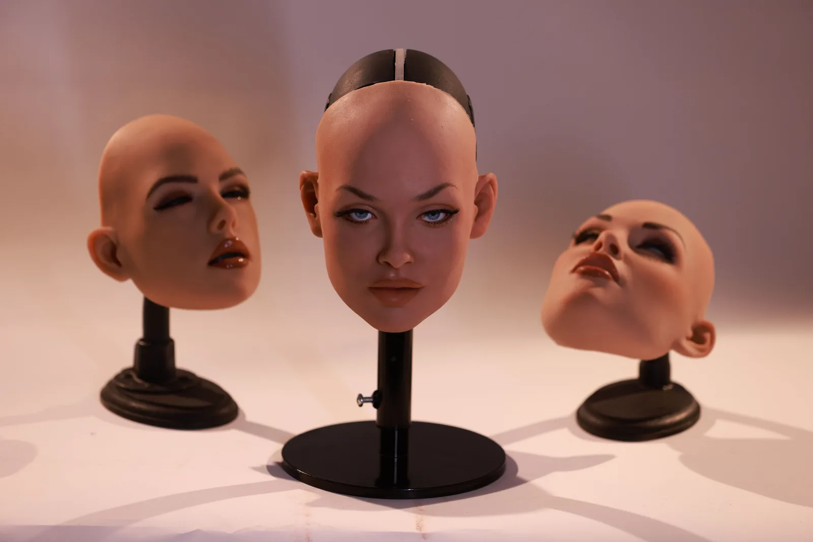 Realbotix interchangeable robot heads on stands