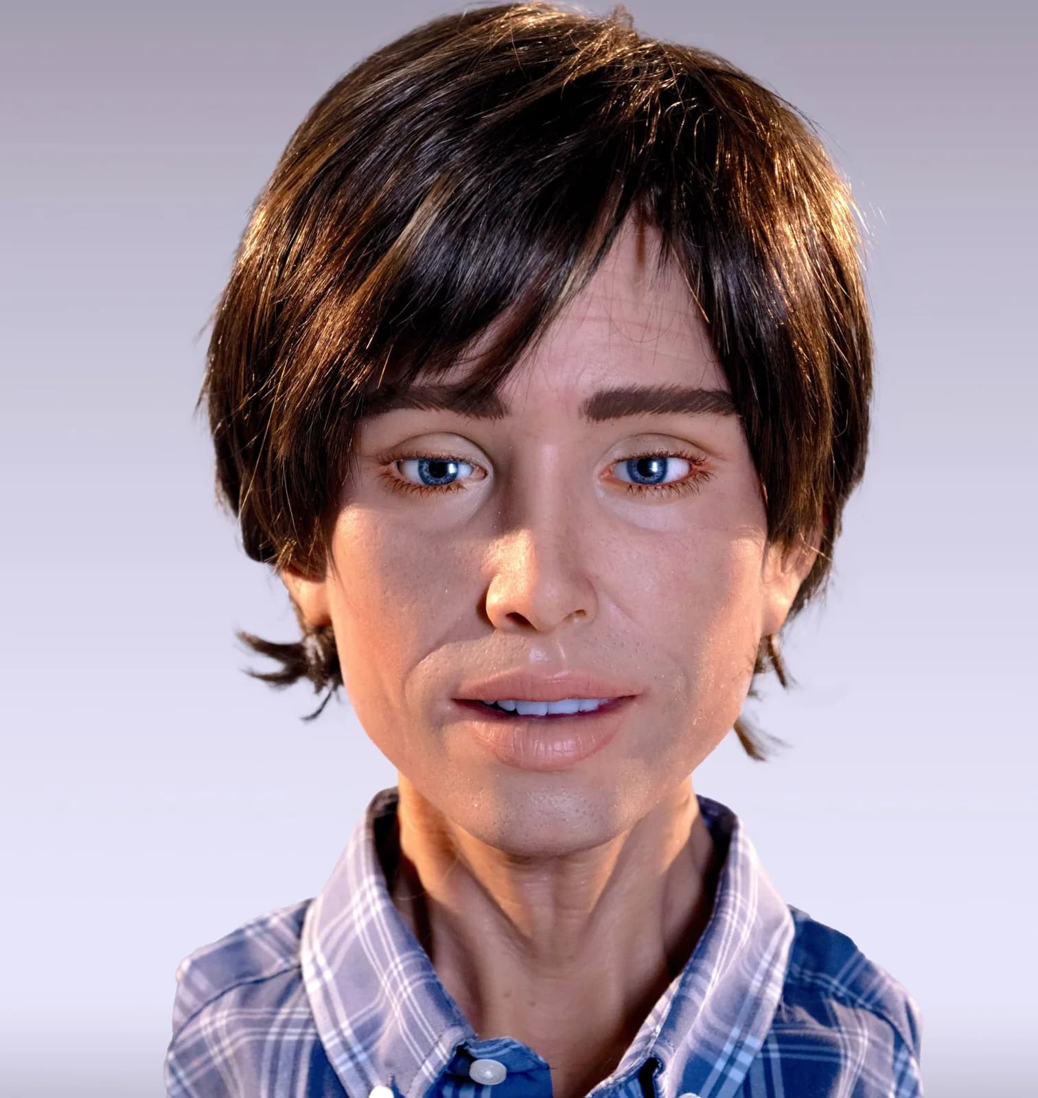 A Realbotix humanoid robot with a short-haired face module