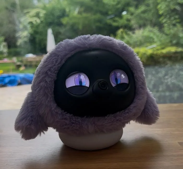 Close-up of a Ropet robot pet's face