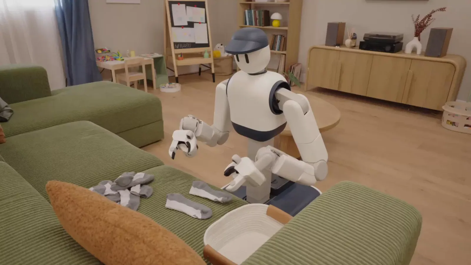 Memo robot tidying a sofa