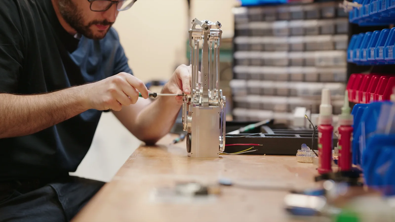 A Weave engineer assembling the Isaac 1 robot